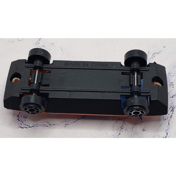 Diecast Orange Sports Car With Fish Theme on Hood - Picture 6 of 6